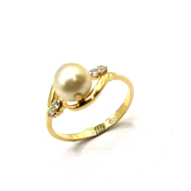 Anillo de oro 18kts, con perla natural y detalles de circonita. Un modelo ideal para niña comunión. Anillo simple y femenino con