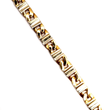 Pulsera de Oro 18kts, diseño plana bicolor, con cierre mosquetón. Longitud de la pulsera 19,5cm. 10.00grs.