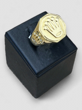 Anillo hombre Oro 18K diseño Rolex. Peso 10.4g 10.40grs.