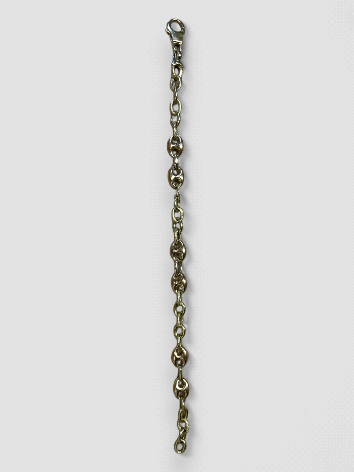 Pulsera Oro 18K estilo grano de café. Peso 9.8g